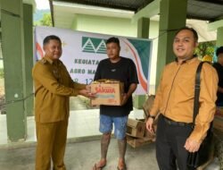 Sinergi Kodim 1310/Bitung Dan PT. Agro Makmur Raya (AMR) Gelar Aksi Sosial Bagi-Bagi Sembako